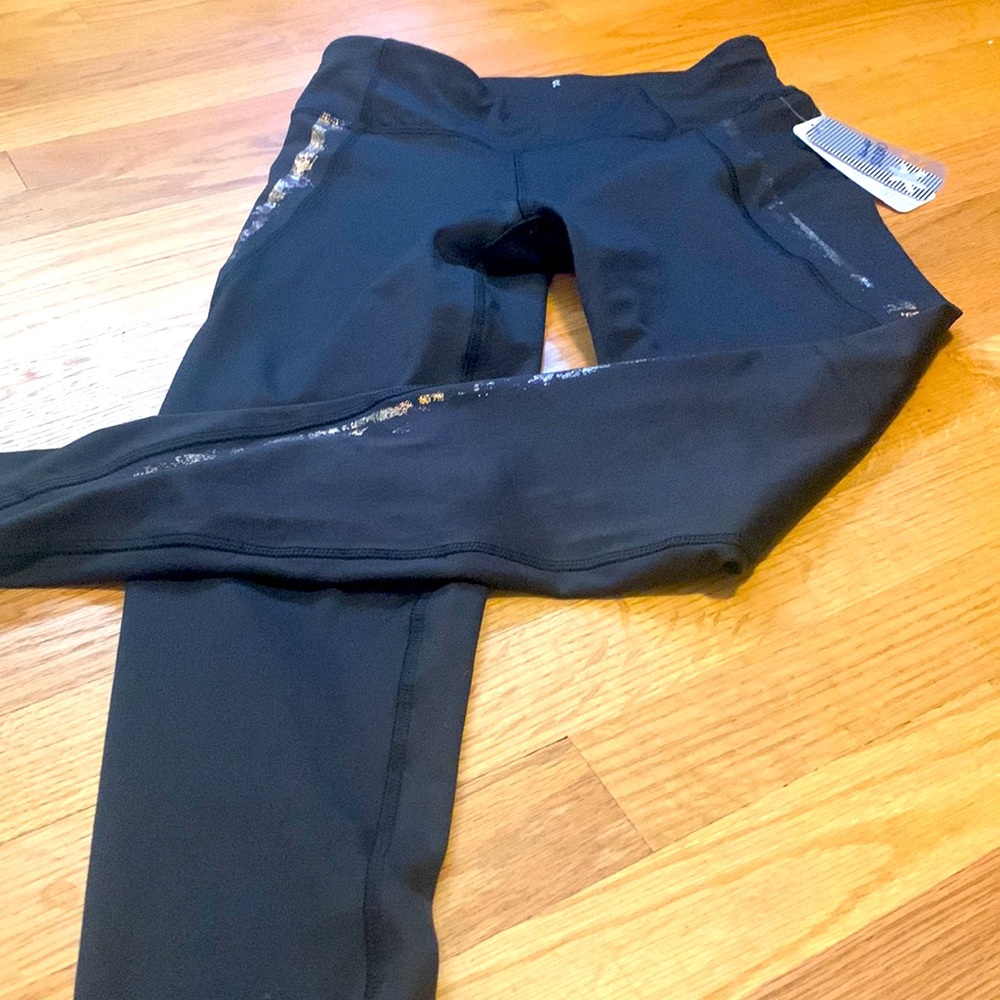 Splendid black leggings with gold trim. Size small. Perfect condition.